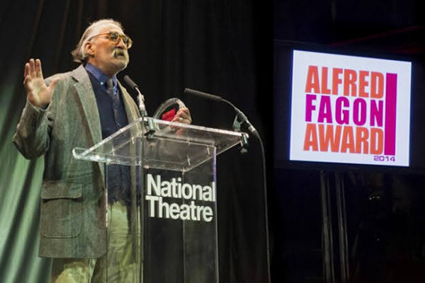 Matura accepting the Alfred Fagon Award for Outstanding Contribution to Writing in 2014